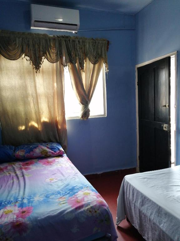 Postel nebo postele na pokoji v ubytování Hotel 24/7