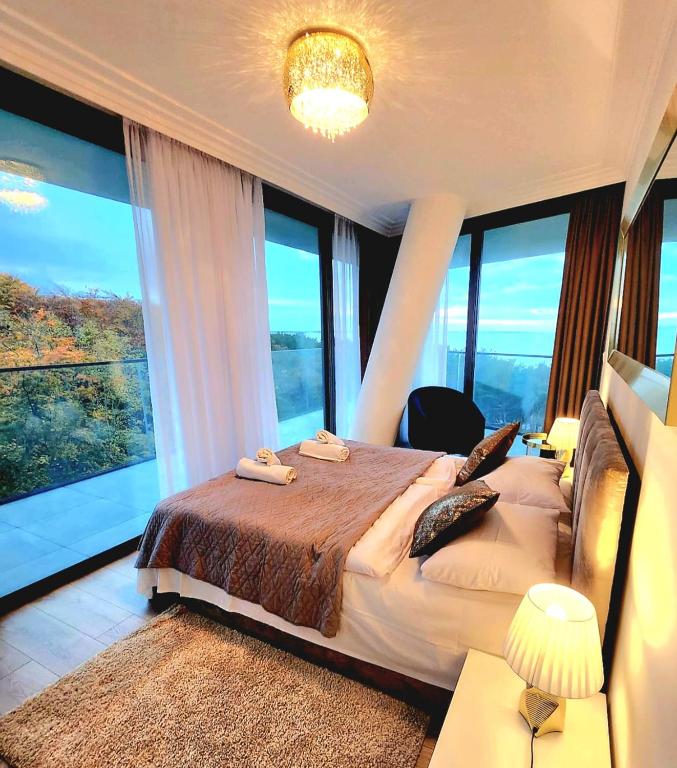 Postel nebo postele na pokoji v ubytování Apartament Mięta