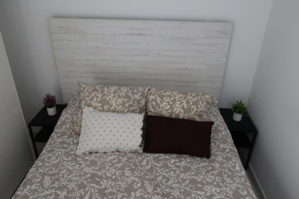 Łóżko lub łóżka w pokoju w obiekcie Apartamento Ve&Va
