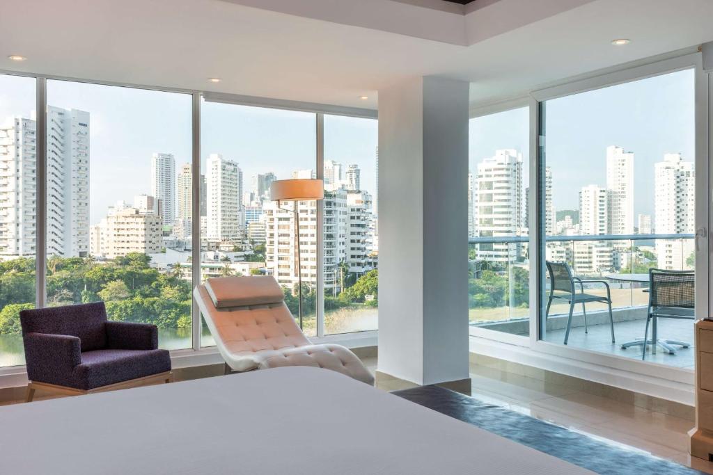 Postel nebo postele na pokoji v ubytování Hilton Cartagena