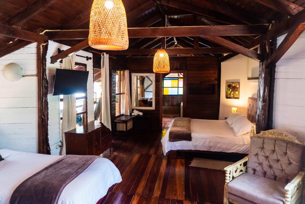 Postel nebo postele na pokoji v ubytování Spa Hosteria Miramelindo