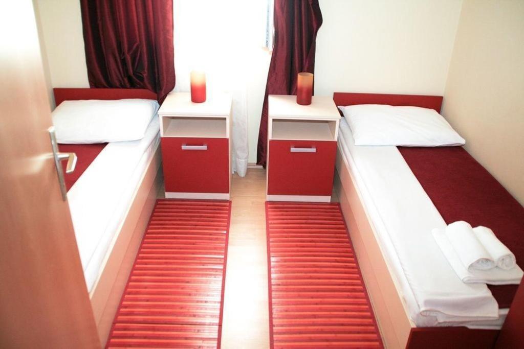 Postel nebo postele na pokoji v ubytování Apartments Seka