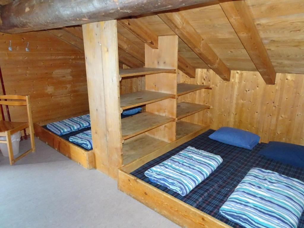 Postel nebo postele na pokoji v ubytování Hostel im Oltä Stall