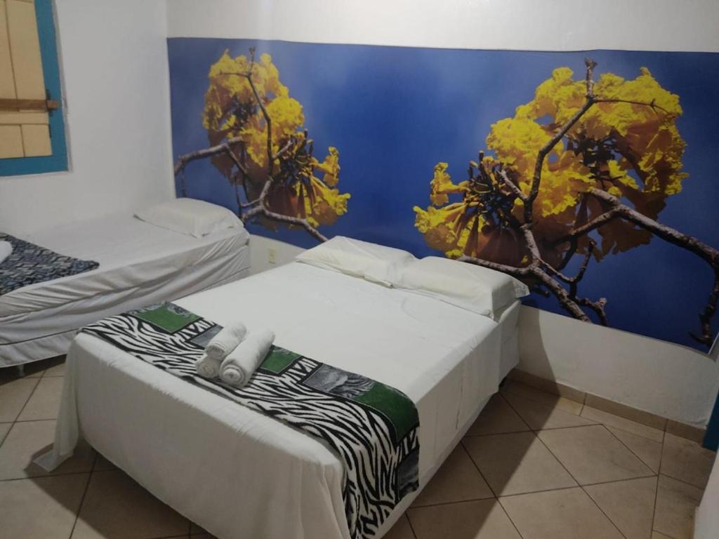Postel nebo postele na pokoji v ubytování Pousada Colonial