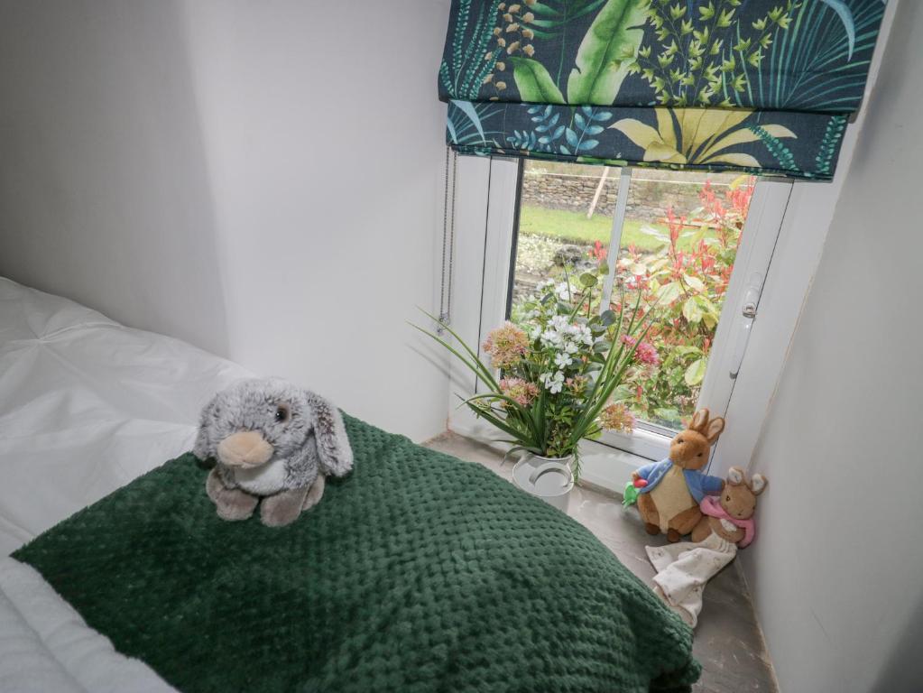 Postel nebo postele na pokoji v ubytování Howgill House
