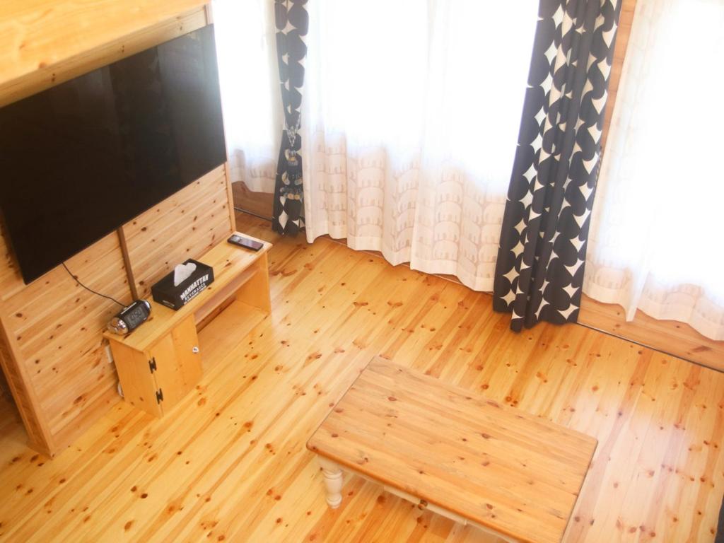 TV a/nebo společenská místnost v ubytování 島ログ