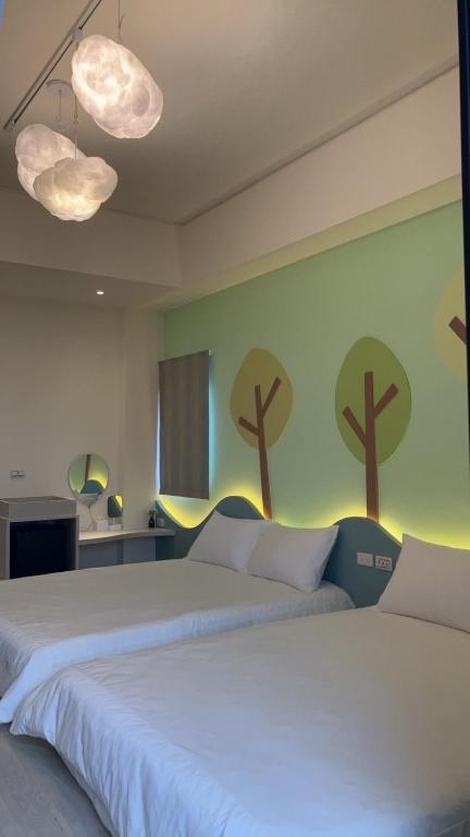 Postel nebo postele na pokoji v ubytování Mi Hai B&B
