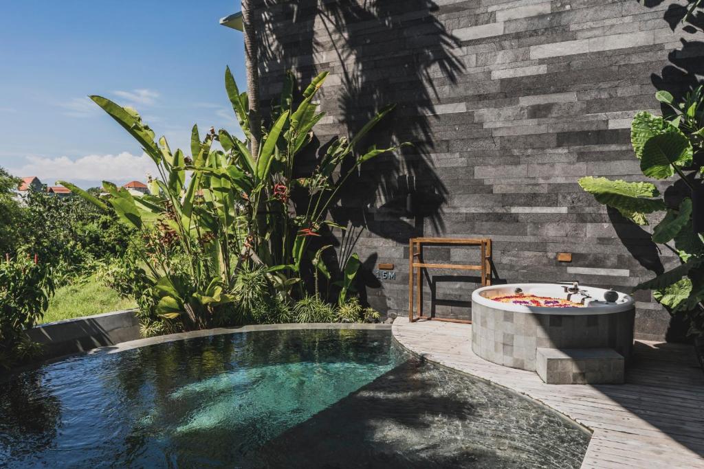 Bazén v ubytování Astera Luxury Resort & Spa Canggu by Ini Vie Hospitality nebo v jeho okolí