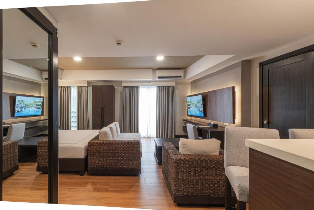 TV a/nebo společenská místnost v ubytování Widus Hotel Clark