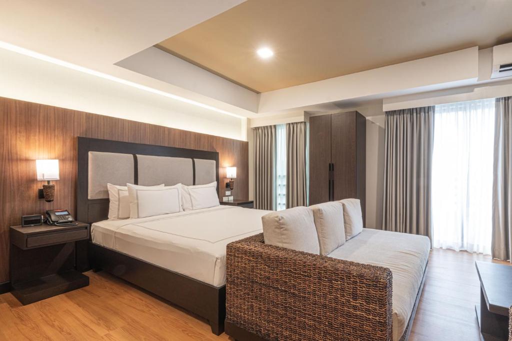 Postel nebo postele na pokoji v ubytování Widus Hotel Clark
