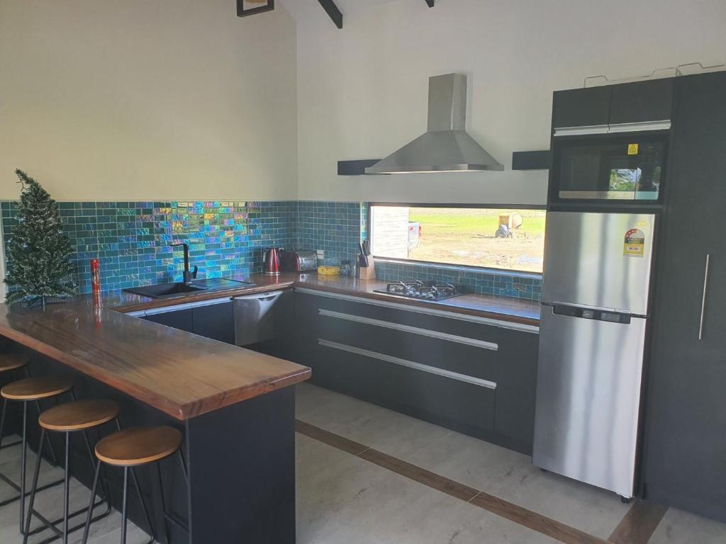 Kuchyň nebo kuchyňský kout v ubytování Bella Villa