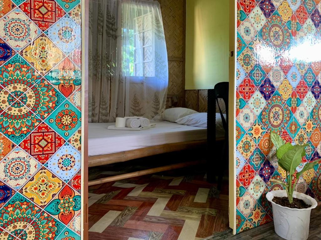 Postel nebo postele na pokoji v ubytování Old Parola Seaside Inn