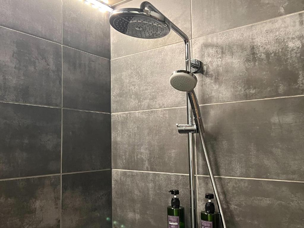 Koupelna v ubytování FUMAI sauna &INN-遠赤外線サウナ-松江の歴史と文化と共に過ごすsmart hotel