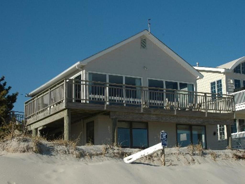 a large house with a balcony on top of it at Nice Home In Brant Beach With 4 Bedrooms And Internet in Brant Beach