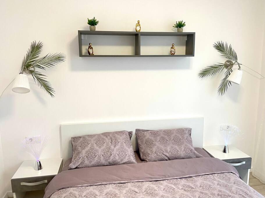 Ένα ή περισσότερα κρεβάτια σε δωμάτιο στο Sunlit Shelter * Ideal Location! Free Parking