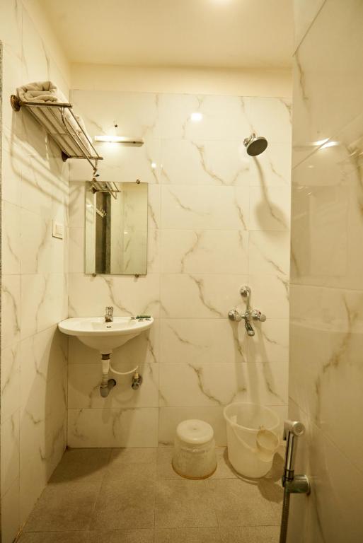 Koupelna v ubytování Hotel Pride Inn Shirdi