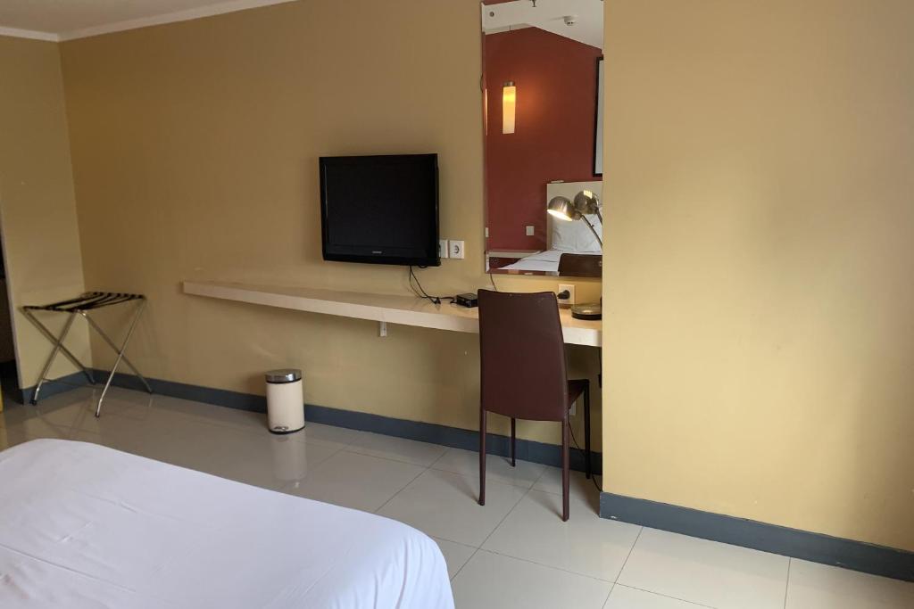 TV a/nebo společenská místnost v ubytování Hotel Glodok Plaza