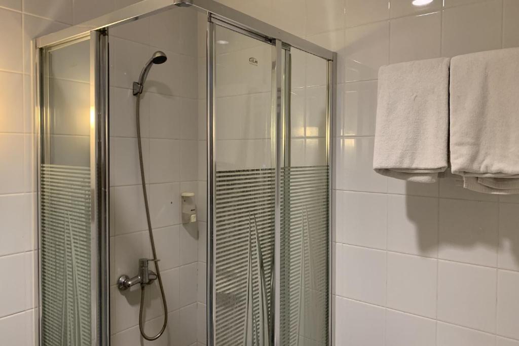 Koupelna v ubytování Hotel Glodok Plaza