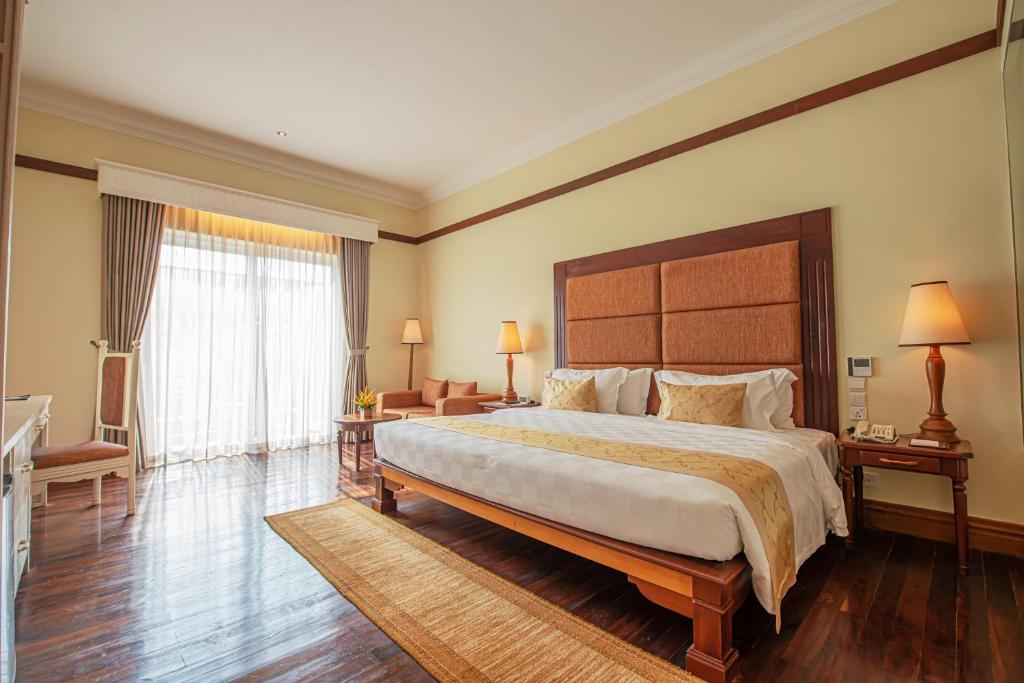 Postel nebo postele na pokoji v ubytování Sokha Siem Reap Resort & Convention Center