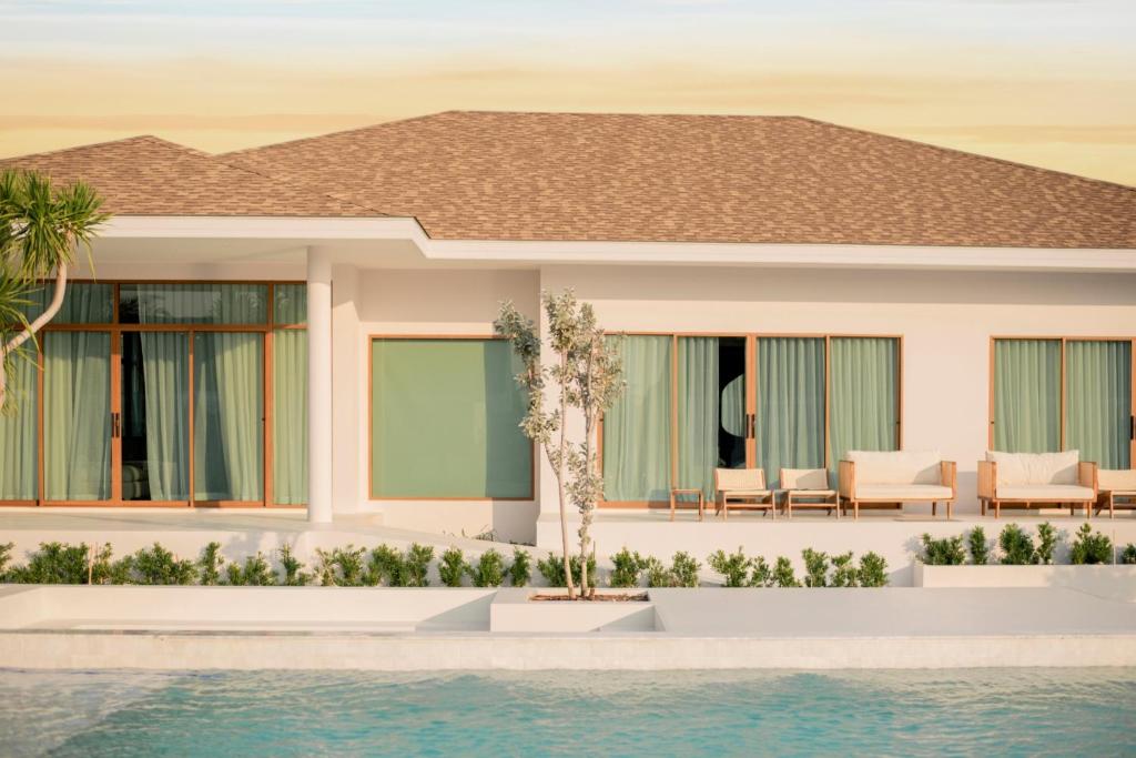 a rendering of a house with a swimming pool at Emmarin Villa Pattaya in Nong Prue