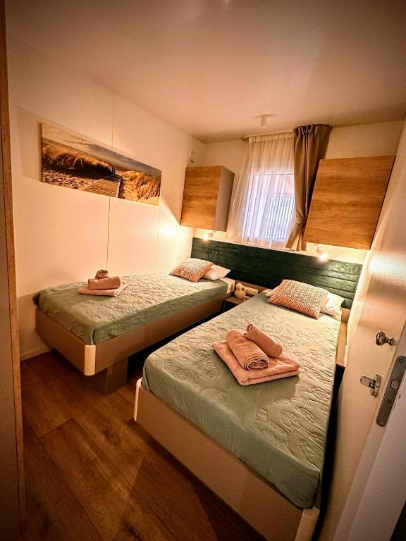 Postel nebo postele na pokoji v ubytování Mobile home TASHA
