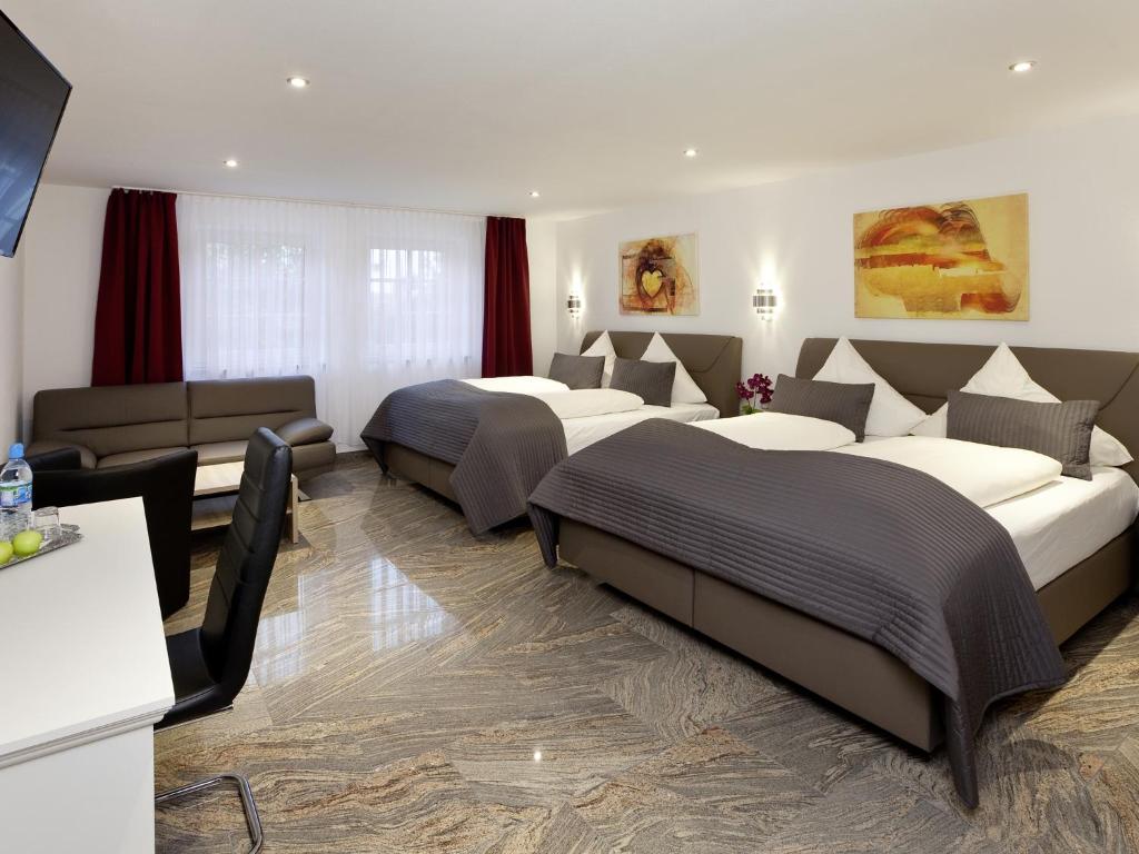 Postel nebo postele na pokoji v ubytování Central City Hotel