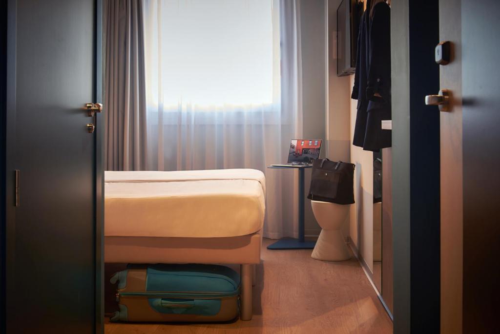 Postel nebo postele na pokoji v ubytování Ibis budget Vitoria Gasteiz