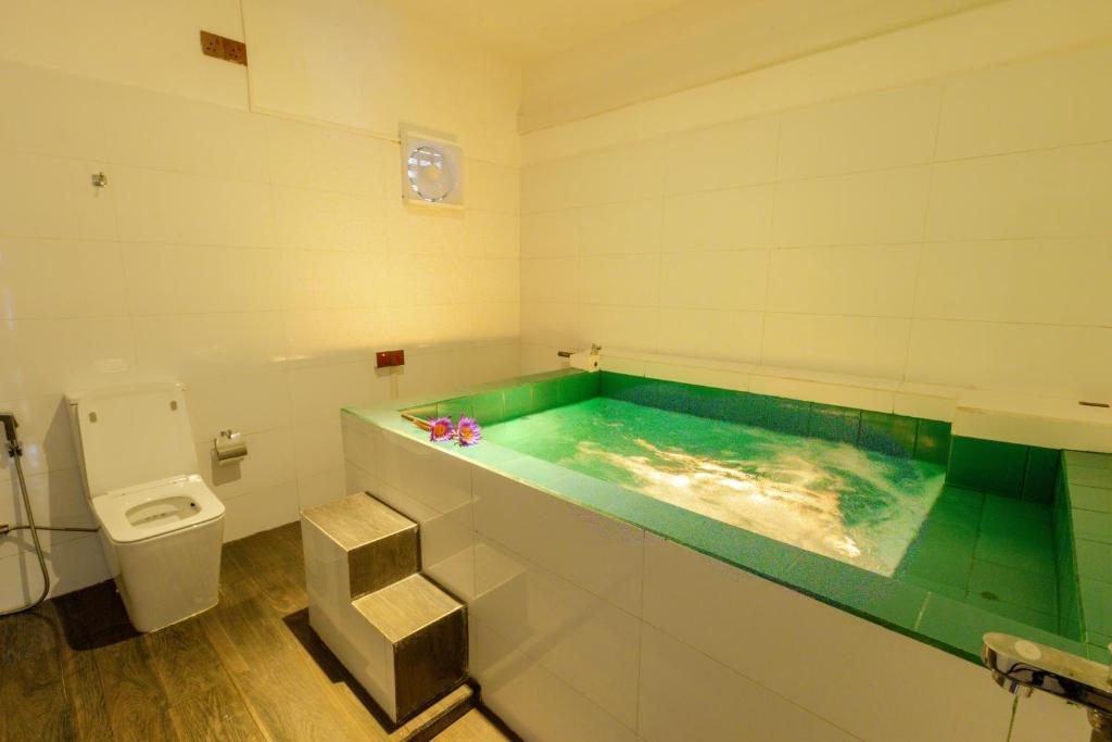 Koupelna v ubytování Elysia Sigiriya Hotel