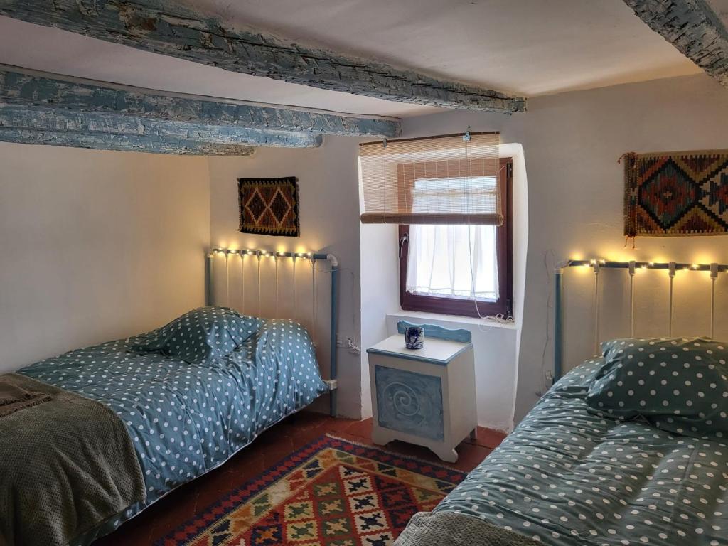 Postel nebo postele na pokoji v ubytování Casa de la Libelula