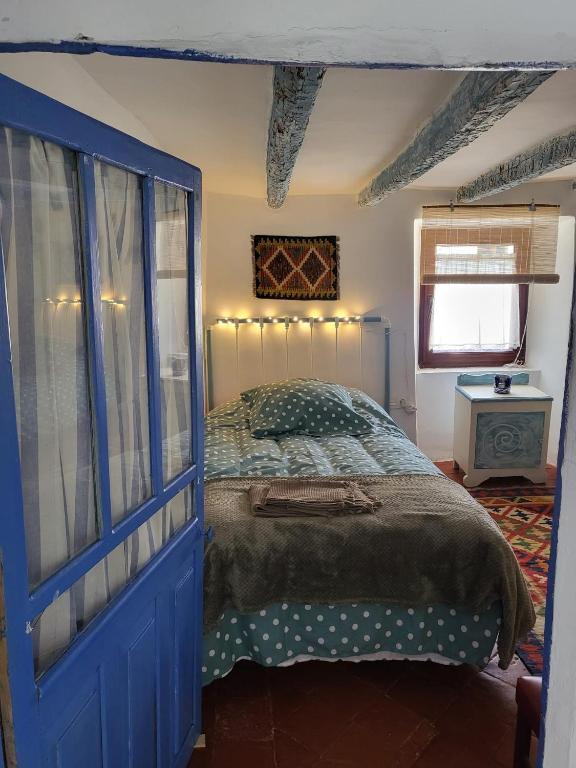 Postel nebo postele na pokoji v ubytování Casa de la Libelula