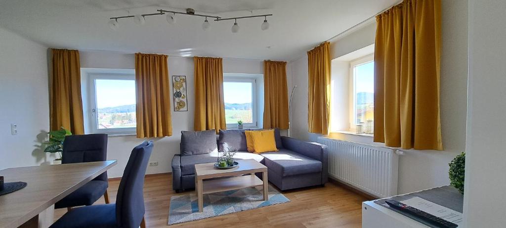 Posezení v ubytování Ferienwohnung Wallersee
