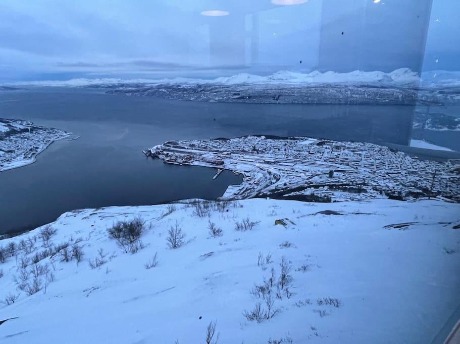 an aerial view of a city in the snow at Narvik sentrum in Narvik