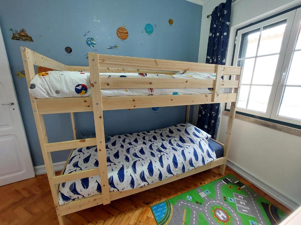 Postel nebo postele na pokoji v ubytování Casa Rio Zêzere