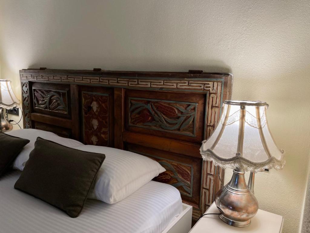 Postel nebo postele na pokoji v ubytování Urla Taş Konak Otel