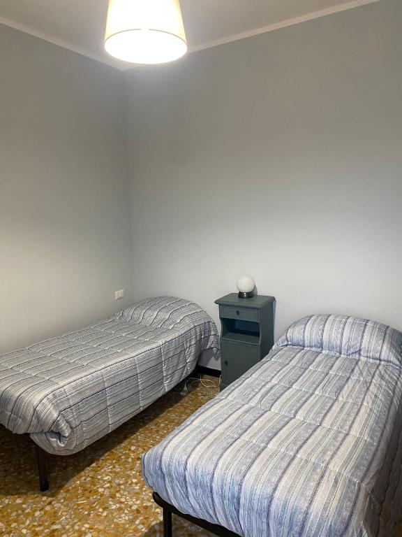 Postel nebo postele na pokoji v ubytování Bella Vista