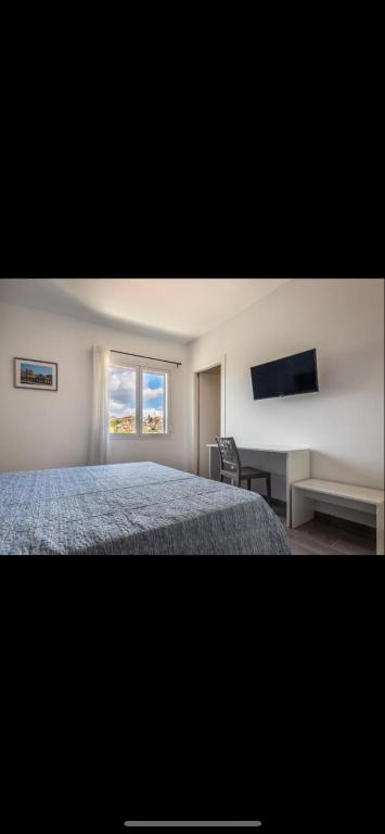 Postel nebo postele na pokoji v ubytování L'Antico Borgo B&B