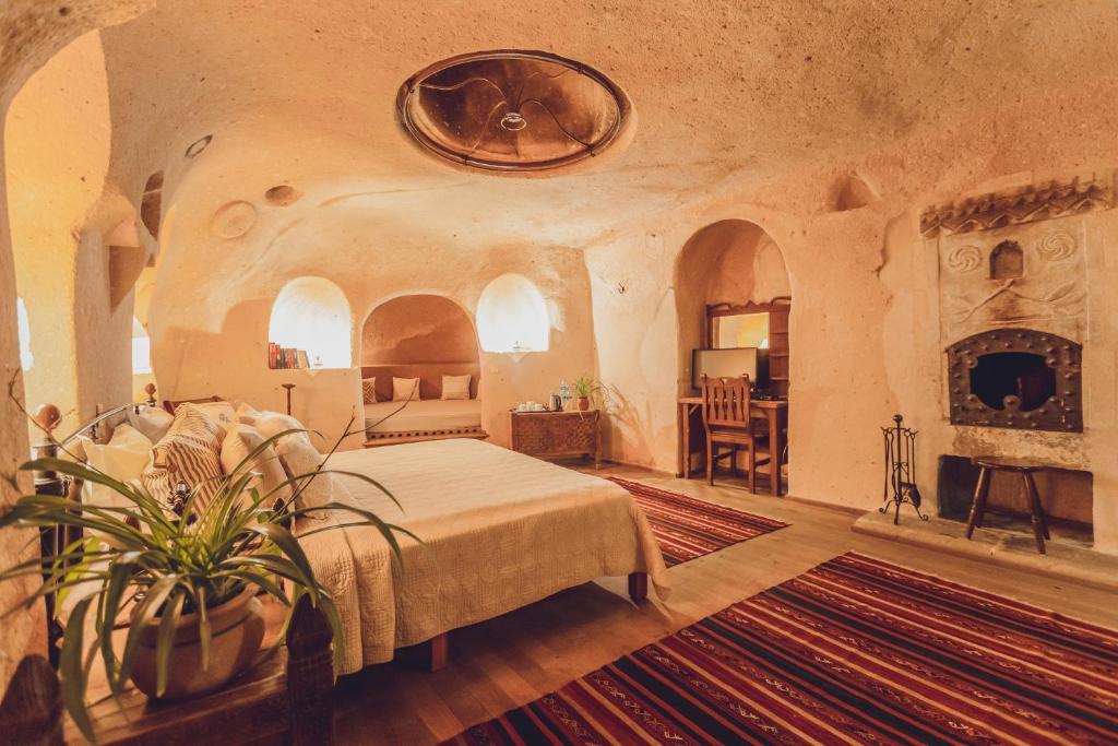 Postel nebo postele na pokoji v ubytování Kale Konak Cappadocia
