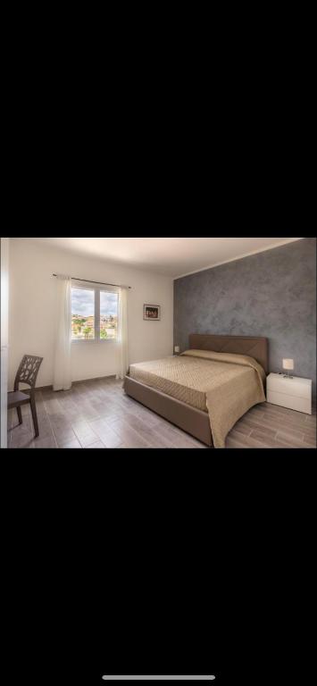 Postel nebo postele na pokoji v ubytování L'Antico Borgo B&B