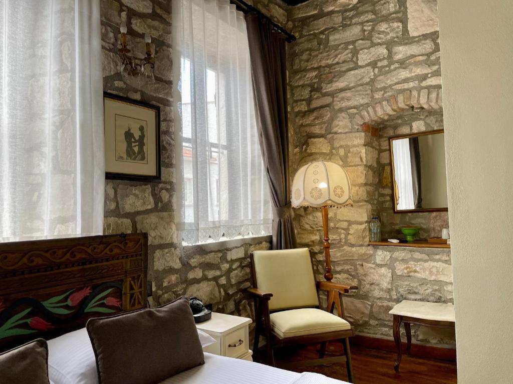 Posezení v ubytování Urla Taş Konak Otel