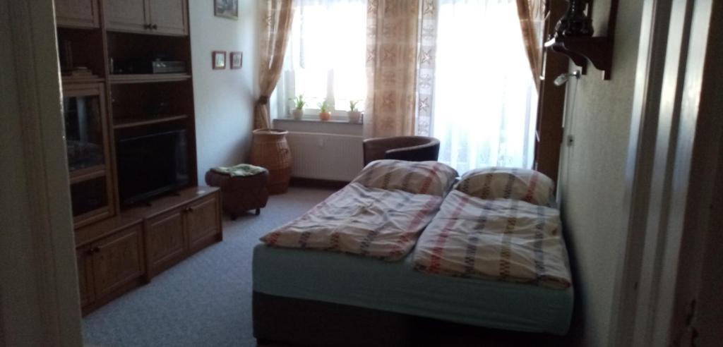Postel nebo postele na pokoji v ubytování Privatzimmer Timm
