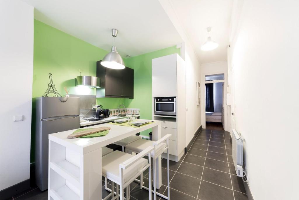 Kuchyňa alebo kuchynka v ubytovaní Appartement calme - quartier prisé Montchat AIL