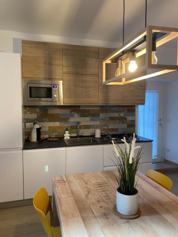 Kuchyň nebo kuchyňský kout v ubytování Casa Marì