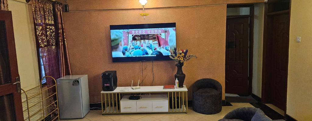 TV a/nebo společenská místnost v ubytování Weavers Haven