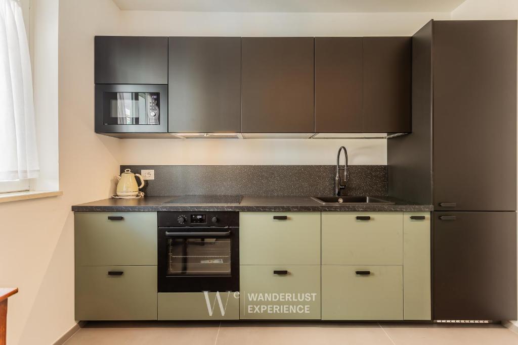 Kuchyň nebo kuchyňský kout v ubytování Wanderlust Experience Mood Apartment
