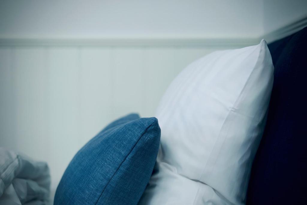 Postel nebo postele na pokoji v ubytování Plesners Badehotel