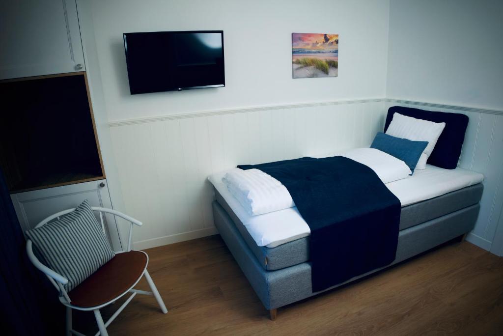 Postel nebo postele na pokoji v ubytování Plesners Badehotel