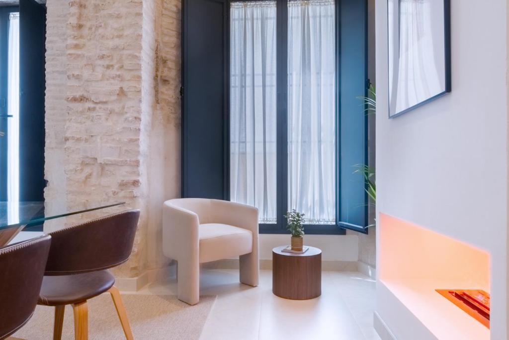 Ruang duduk di Luxurious studio located in Casa Pilatos