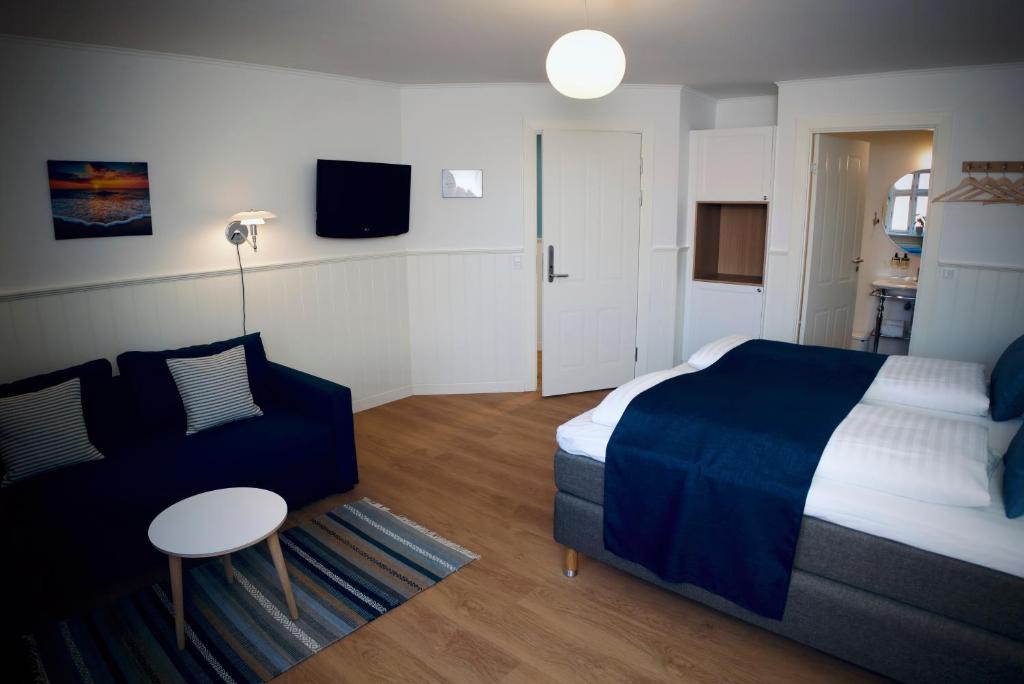Postel nebo postele na pokoji v ubytování Plesners Badehotel