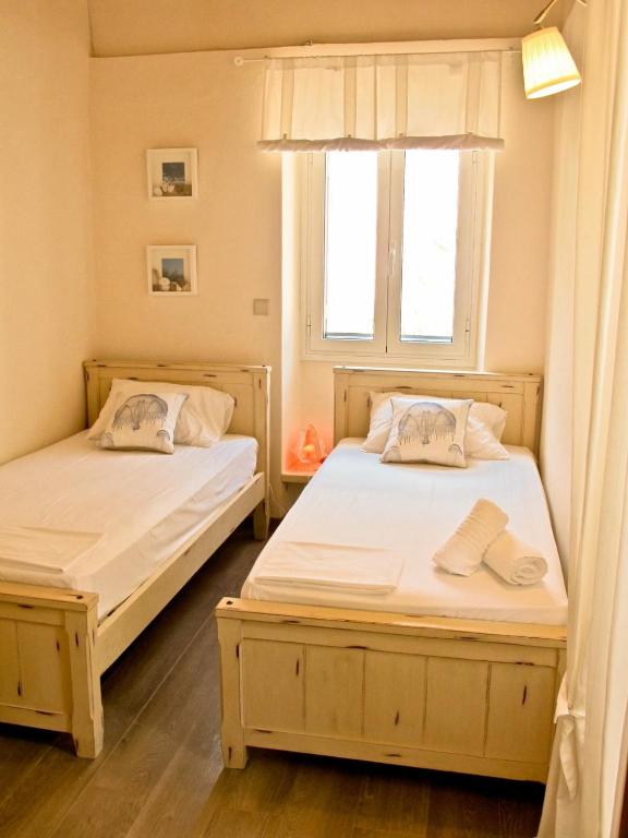 Postel nebo postele na pokoji v ubytování Theano Cottage