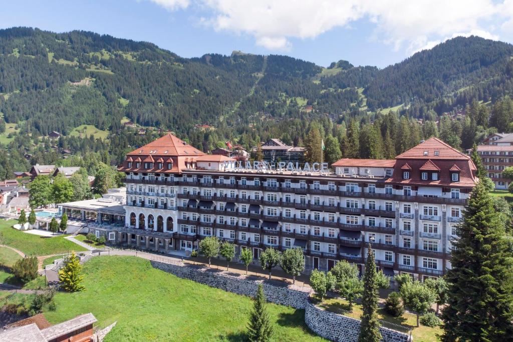 an aerial view of a hotel in the mountains at Villars Palace in Villars-sur-Ollon